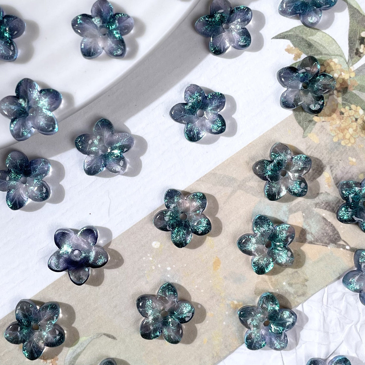 10mm five-petal glass flower beads in Fluorite Blue-Green, 50 pieces per pack
