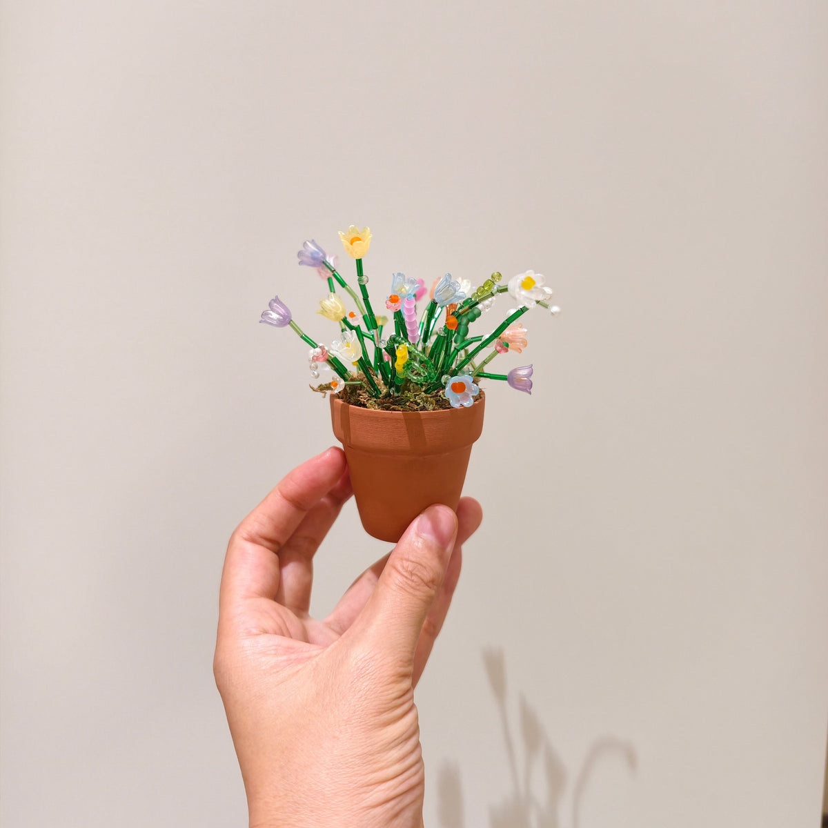 Finished mini beaded flower pot with crystal bead leaves