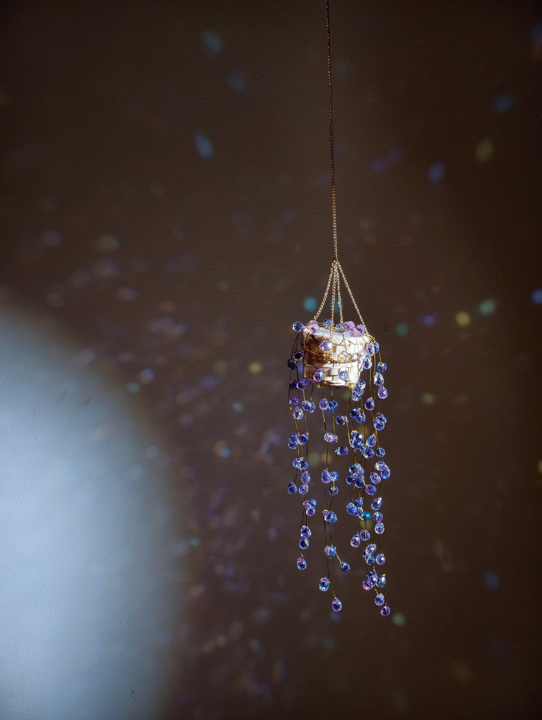 Finished Purple Wisteria Mermaid’s Tears beaded plant displayed in natural light