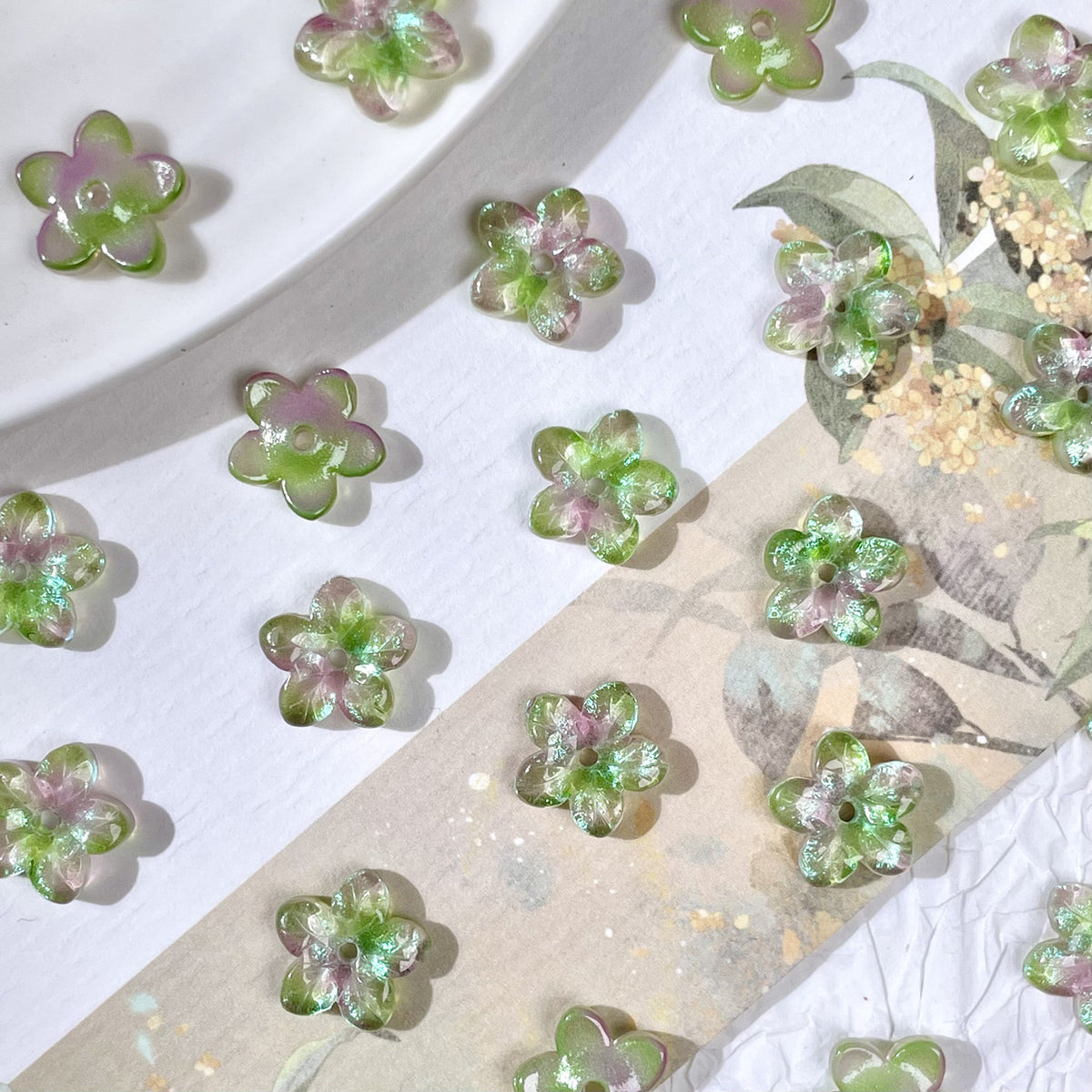 10mm five-petal glass flower beads in Iridescent Green & Pink, 50 pieces per pack