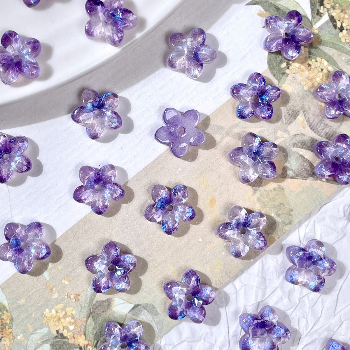 10mm five-petal glass flower beads in Iridescent Mist Purple, 50 pieces per pack