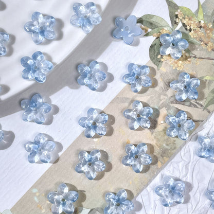 10mm five-petal glass flower beads in Iridescent Ocean Blue, 50 pieces per pack