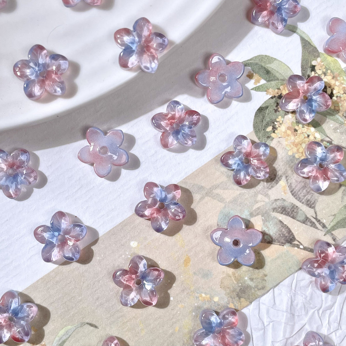 10mm five-petal glass flower beads in Sunset Haze, 50 pieces per pack