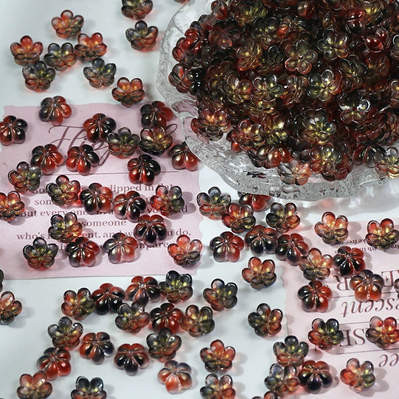 10mm glass plum blossom beads in Black & Red Gold, 50 pieces per pack