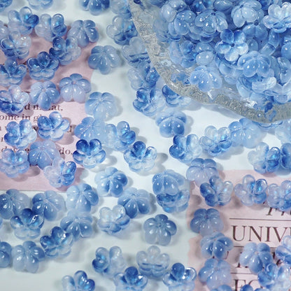 10mm glass plum blossom beads in Ice Blue Gold, 50 pieces per pack