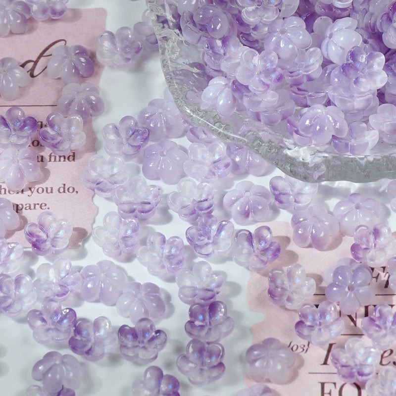 10mm glass plum blossom beads in Iridescent Mist Purple, 50 pieces per pack
