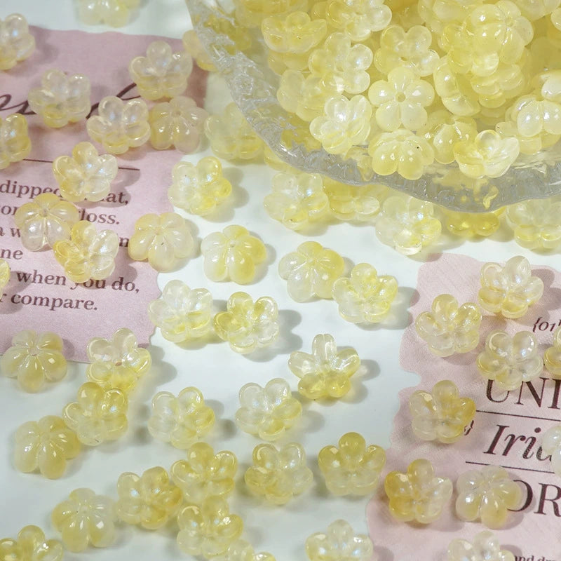 10mm glass plum blossom beads in Iridescent Yellow, 50 pieces per pack