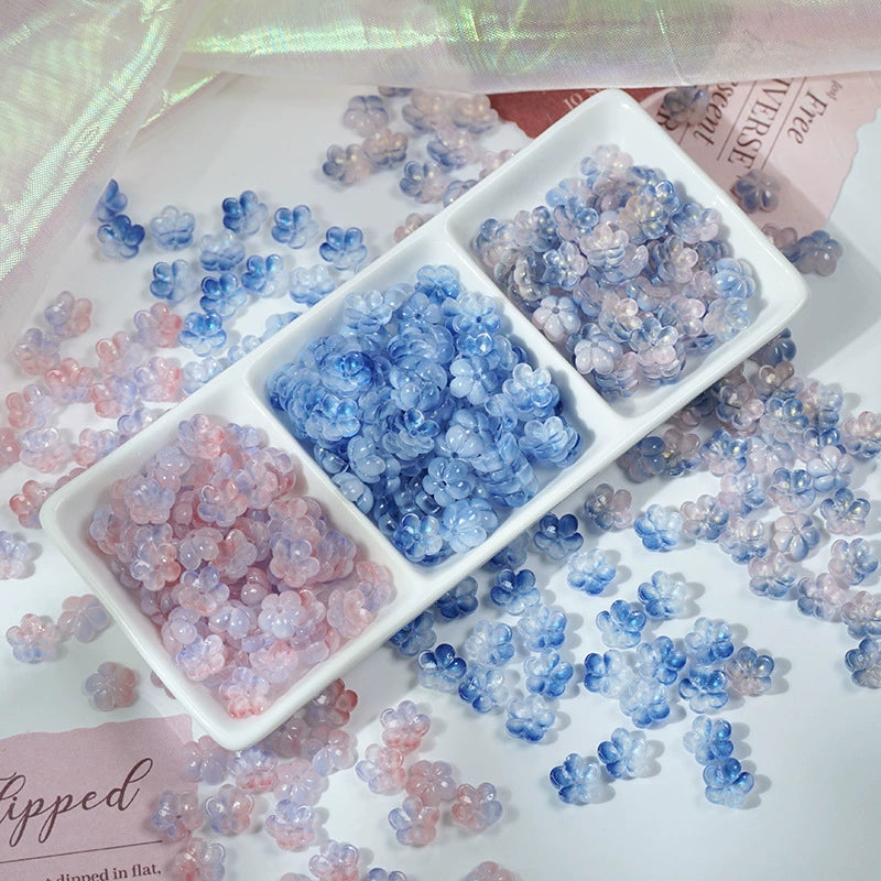 10mm glass plum blossom beads in a random color mix, 50 pieces per pack