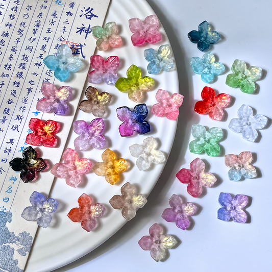 14mm four-petal glass hydrangea flower beads in a random color mix, 50 pieces per pack