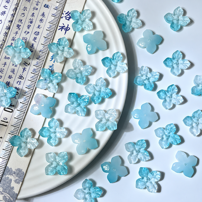14mm four-petal glass hydrangea beads in Sky Blue Gradient, 50 pieces per pack