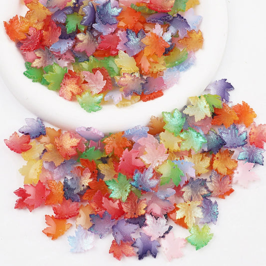 16mm glass maple leaf beads in assorted colors, sold in packs of 100