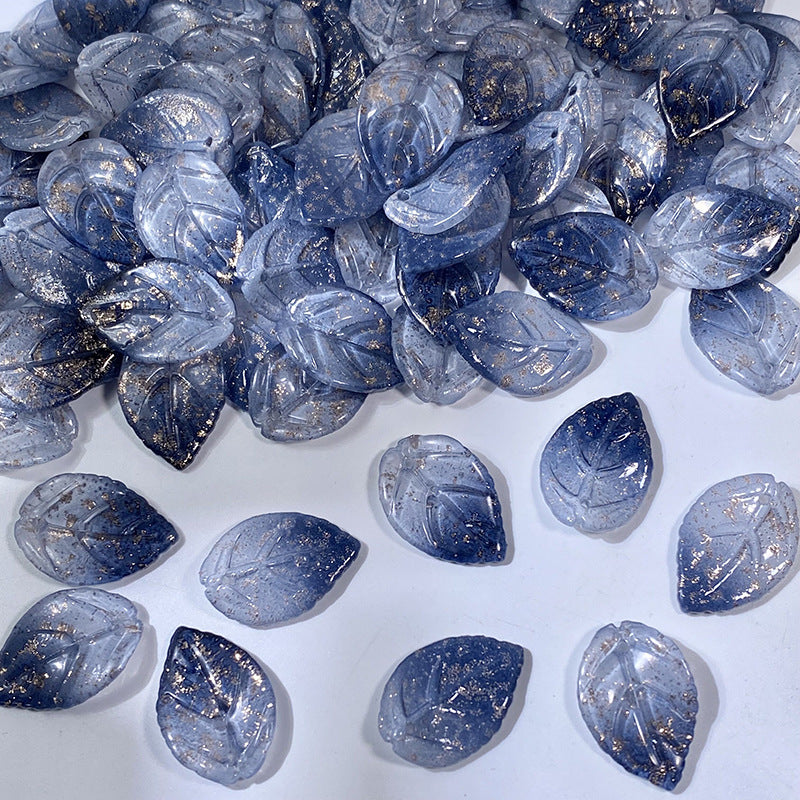 18x26mm glass camellia leaf beads in Smoky Blue Gold Fleck, 50 pieces per pack