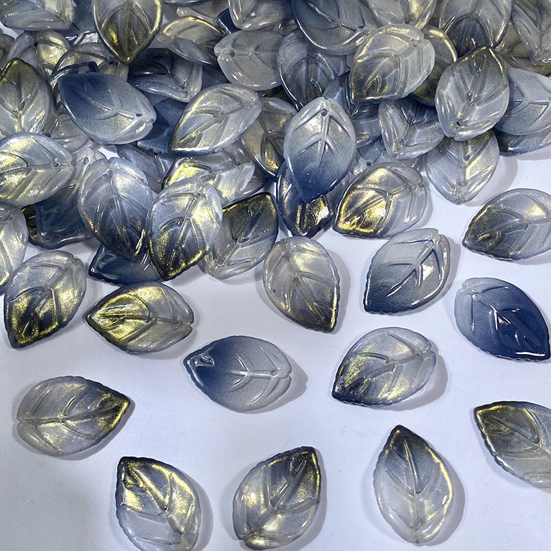 18x26mm glass camellia leaf beads in Smoky Blue Gold, 50 pieces per pack