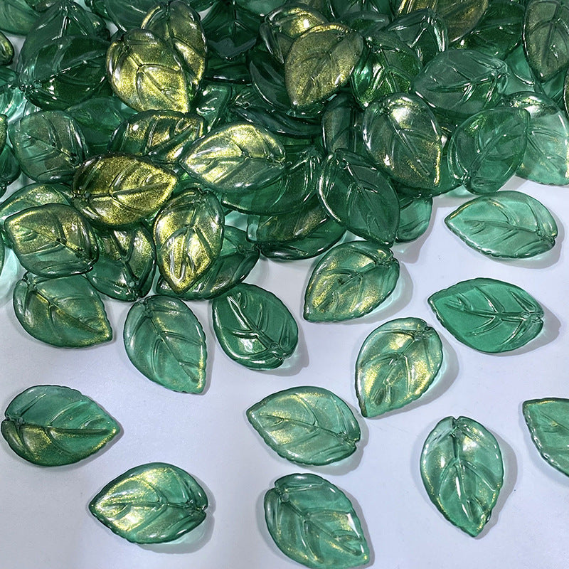 18x26mm glass camellia leaf beads in Emerald Green Gold, 50 pieces per pack