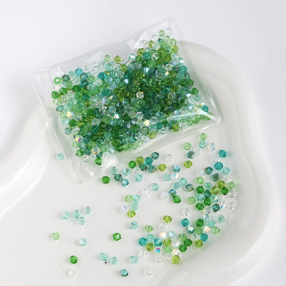 Fresh Green mix of 4mm faceted crystal glass bicone beads, 200 pieces per pack