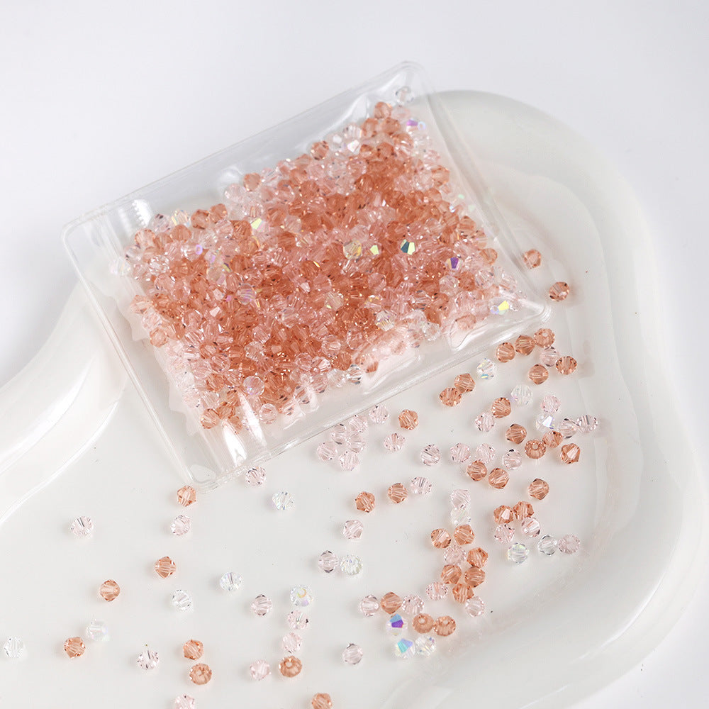 Pink Champagne mix of 4mm faceted crystal glass bicone beads, 200 pieces per pack