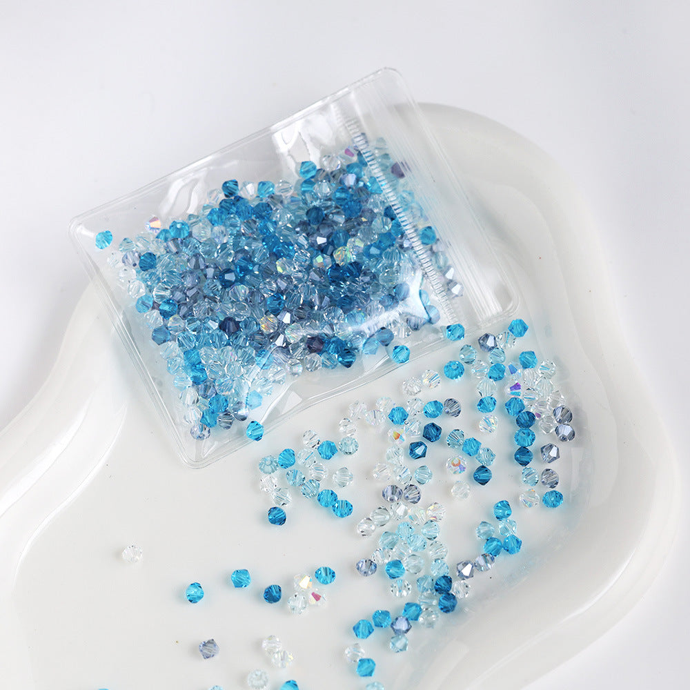Sky Blue mix of 4mm faceted crystal glass bicone beads, 200 pieces per pack