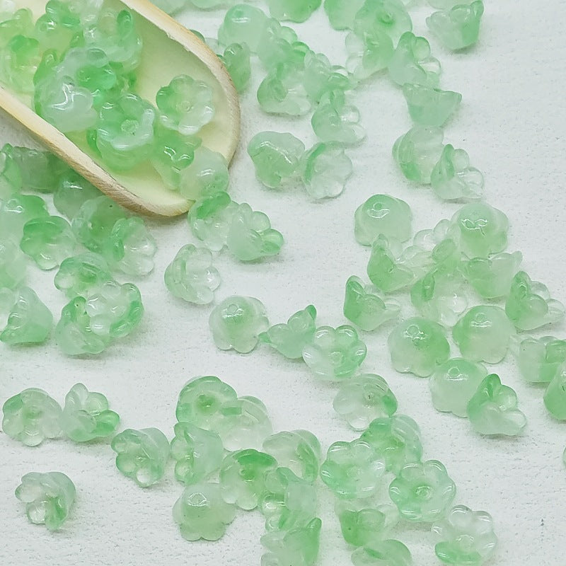 7 x 12 mm glass lily of the valley flower beads in apple green - 50 beads per pack