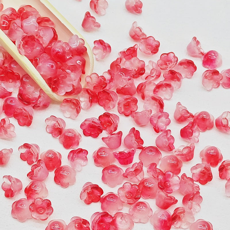 7 x 12 mm glass lily of the valley flower beads in bright red - 50 beads per pack