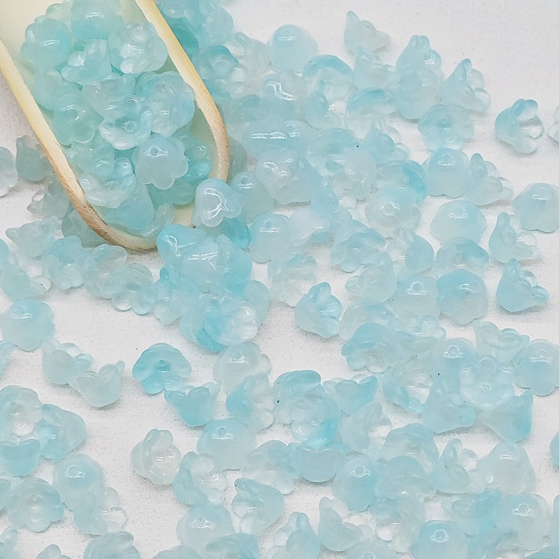 7 x 12 mm glass lily of the valley flower beads in lake blue - 50 beads per pack