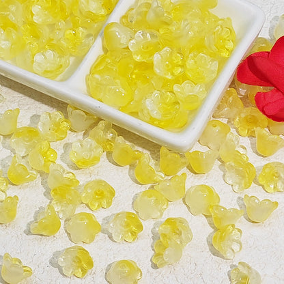 7 x 12 mm glass lily of the valley flower beads in lemon yellow - 50 beads per pack