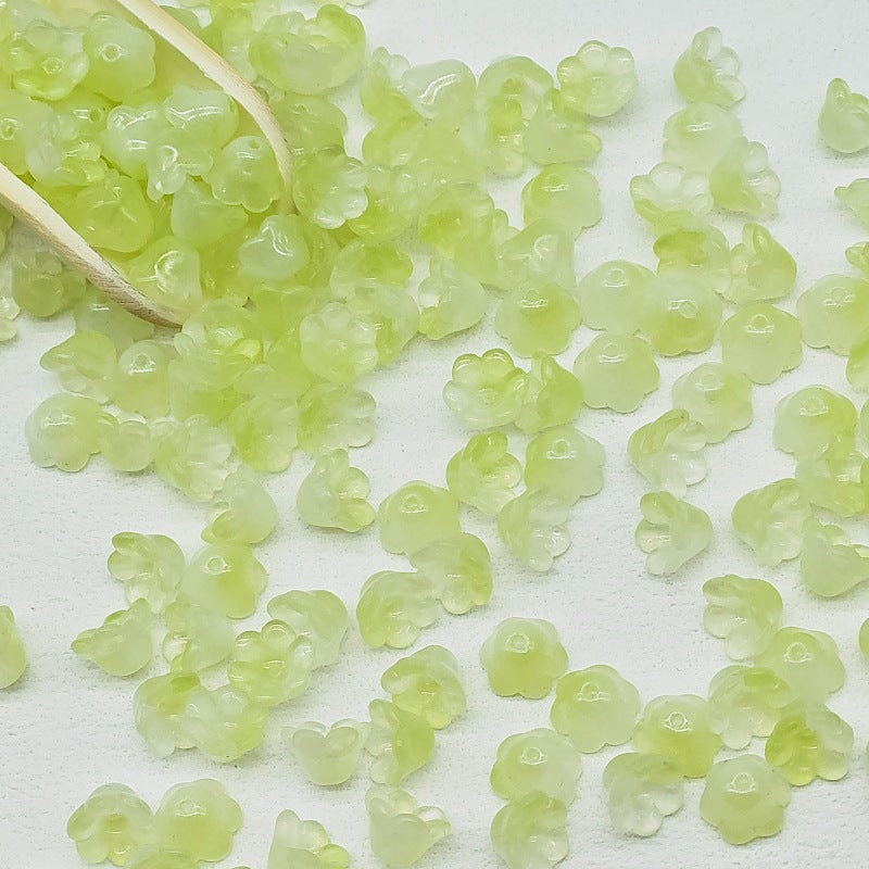 7 x 12 mm glass lily of the valley flower beads in light green - 50 beads per pack