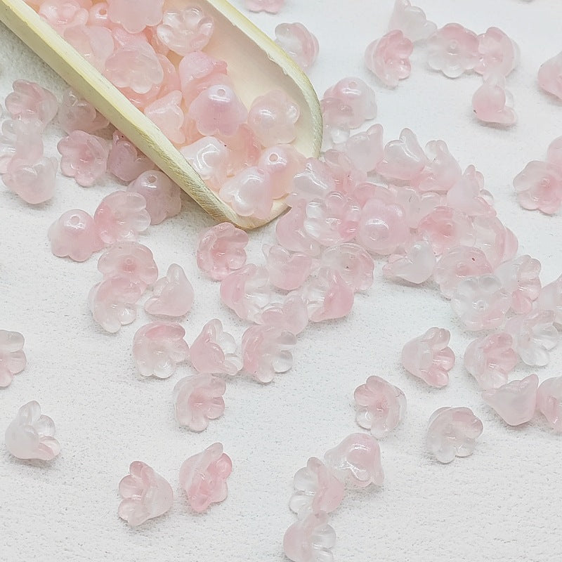 7 x 12 mm glass lily of the valley flower beads in light pink - 50 beads per pack