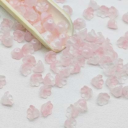 7 x 12 mm glass lily of the valley flower beads in light pink - 50 beads per pack