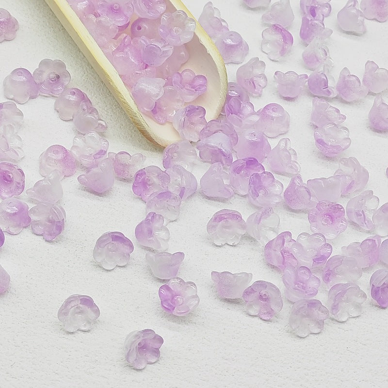 7 x 12 mm glass lily of the valley flower beads in light purple - 50 beads per pack