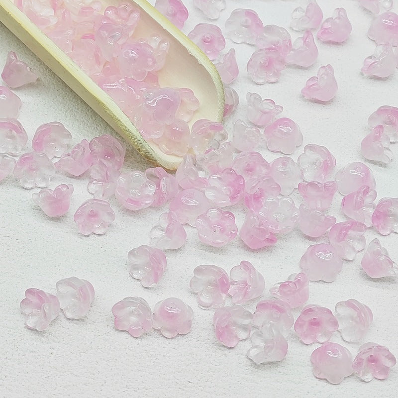 7 x 12 mm glass lily of the valley flower beads in pink - 50 beads per pack