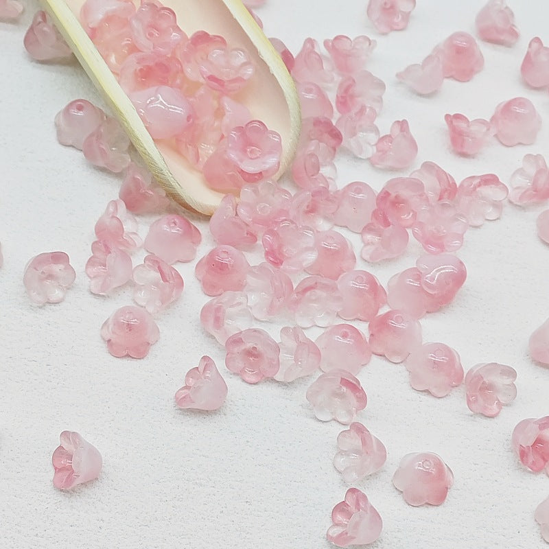 7 x 12 mm glass lily of the valley flower beads in rose pink - 50 beads per pack