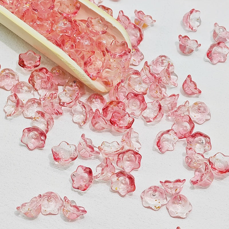 7 x 12 mm glass lily of the valley flower beads in transparent rose - 50 beads per pack