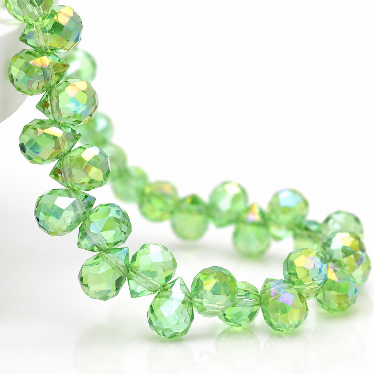 Olive green faceted glass teardrop beads for DIY craft projects