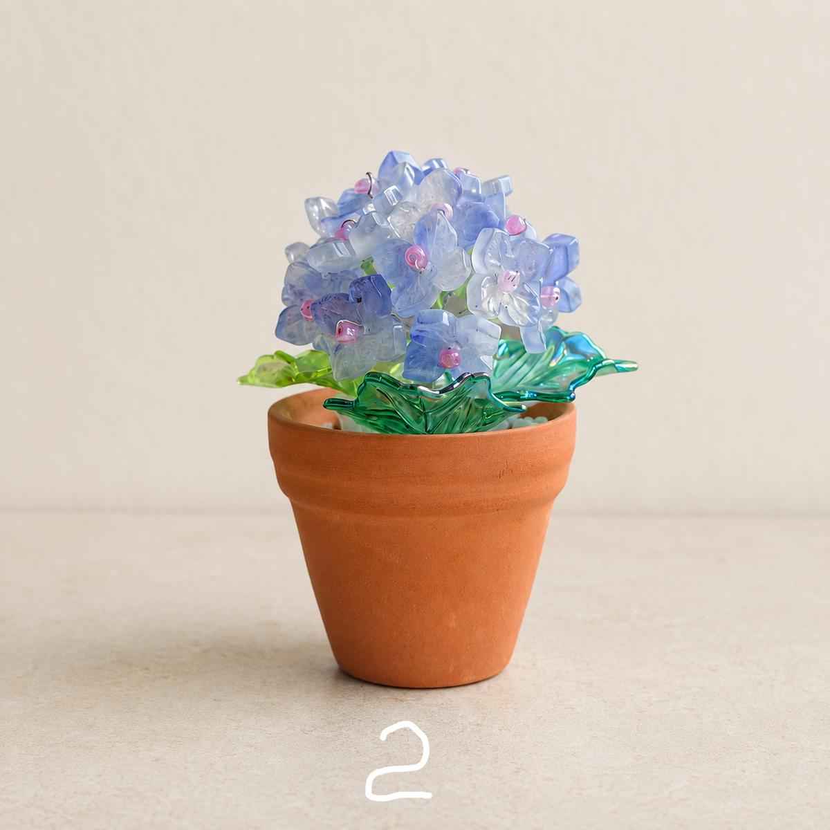 Periwinkle blue beaded hydrangea fridge magnet in a mini terracotta pot