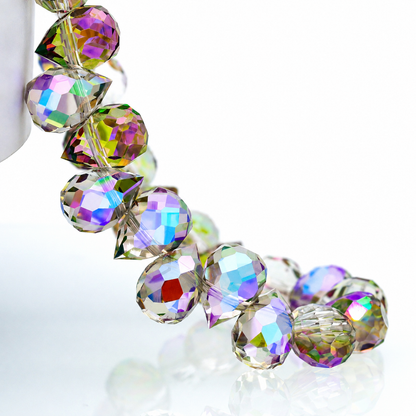 Phantom Purple faceted teardrop K9 glass bead strand