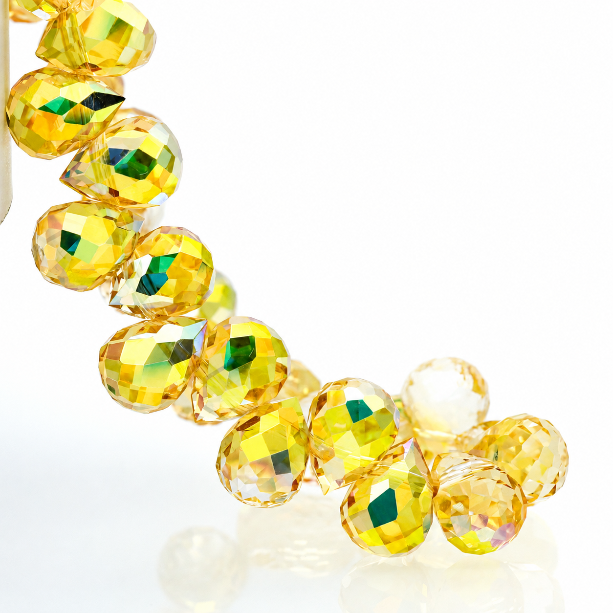 Brilliant Gold faceted teardrop K9 glass bead strand