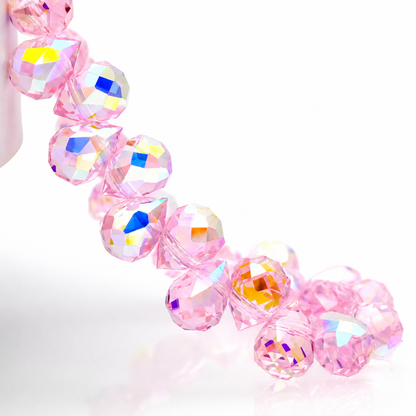 Pink Aurora AB faceted teardrop K9 glass bead strand