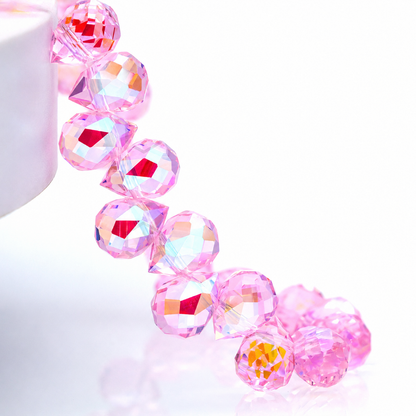 Pink Heavenly Light faceted teardrop K9 glass bead strand