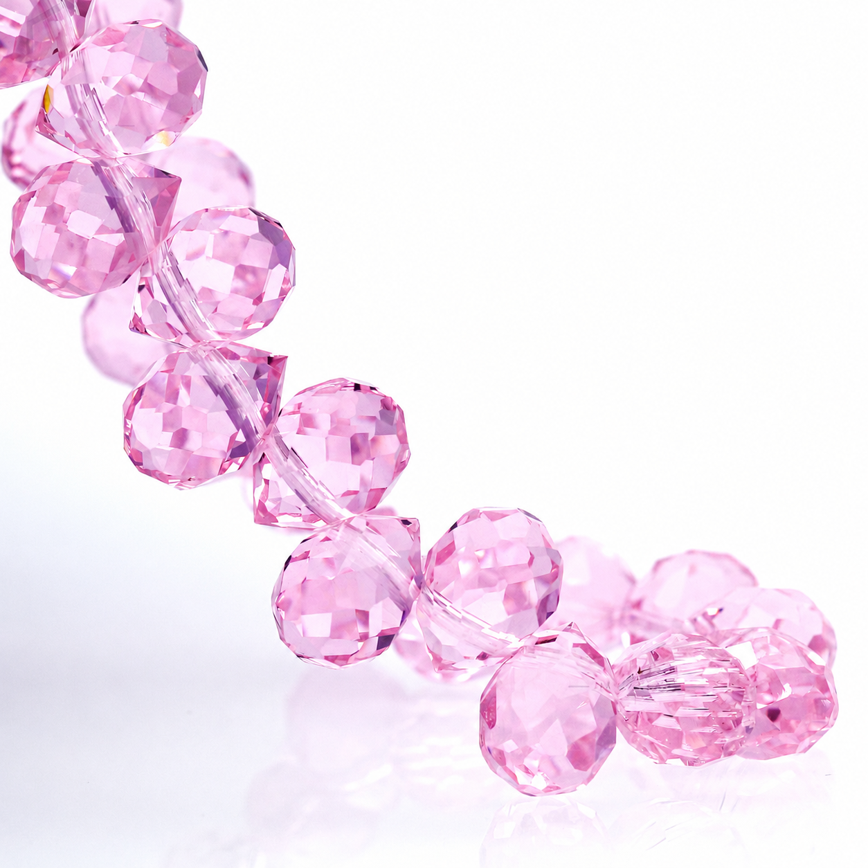 Rose Pink faceted teardrop K9 glass bead strand