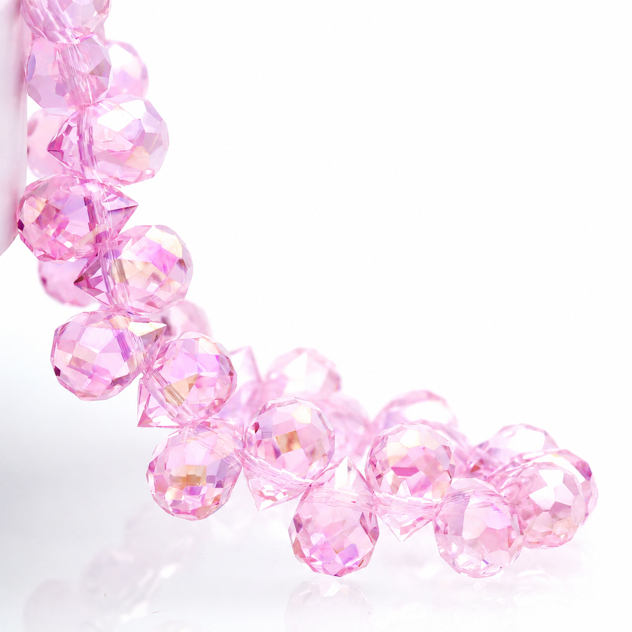 Rose Pink AB faceted teardrop K9 glass bead strand