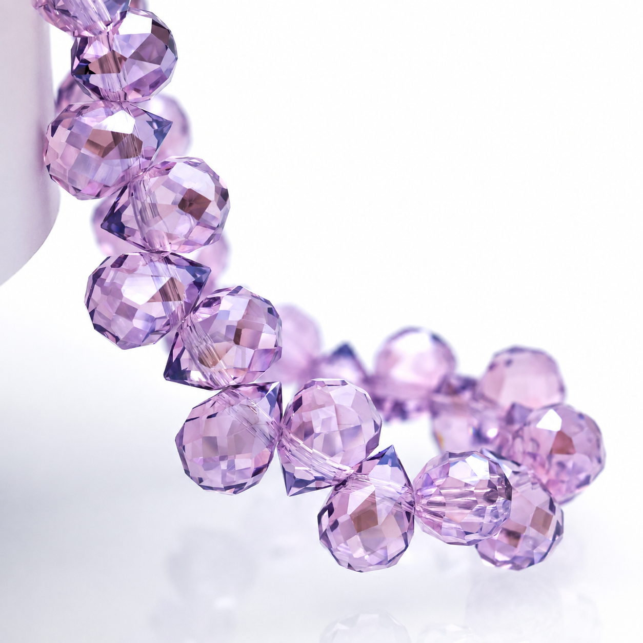 Pink Lavender faceted teardrop K9 glass bead strand
