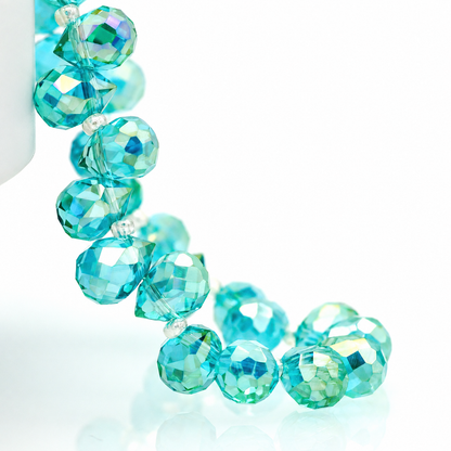 Ocean Blue AB faceted teardrop K9 glass bead strand