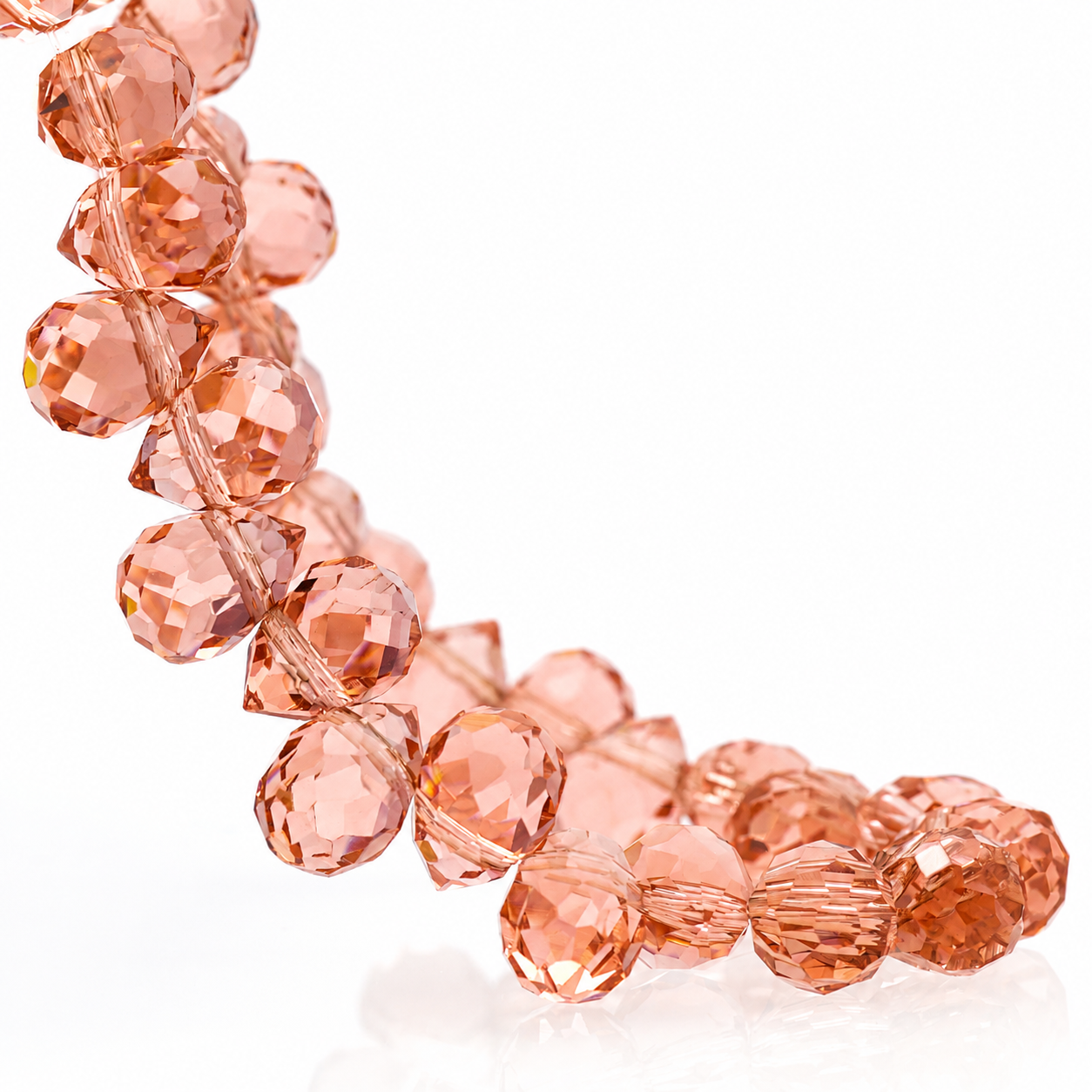 Grapefruit Red faceted teardrop K9 glass bead strand