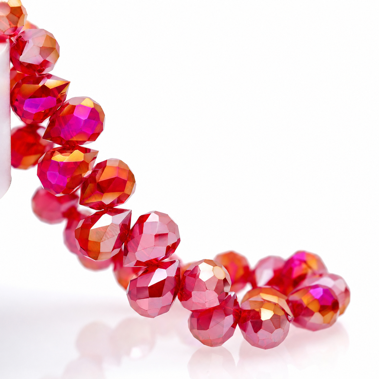 Vivid Red AB faceted teardrop K9 glass bead strand