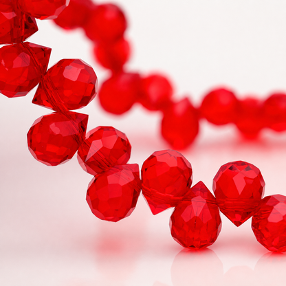 Vivid Red faceted teardrop K9 glass bead strand