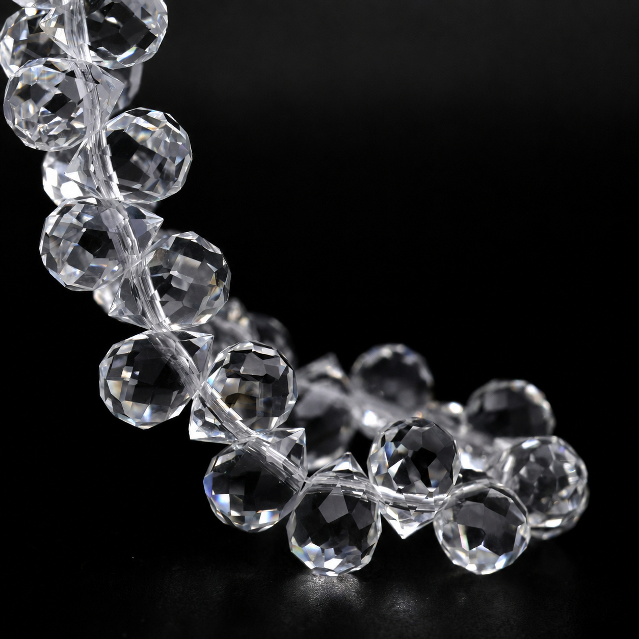 Opaque White faceted teardrop K9 glass bead strand