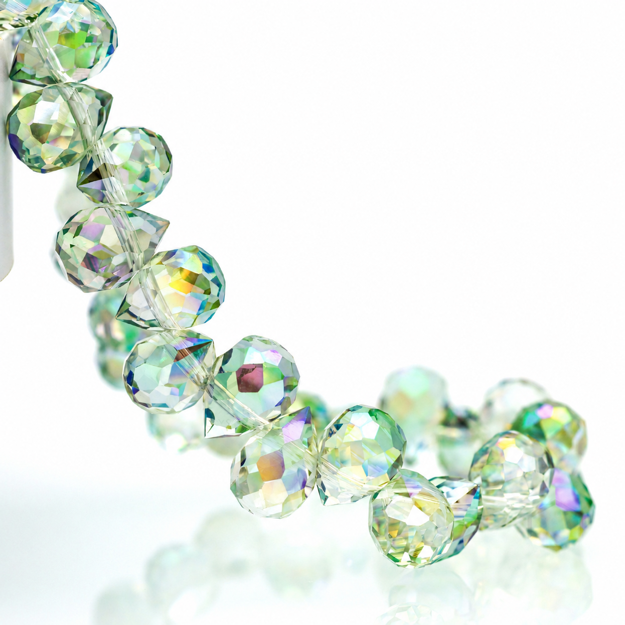 Spring Green faceted teardrop K9 glass bead strand
