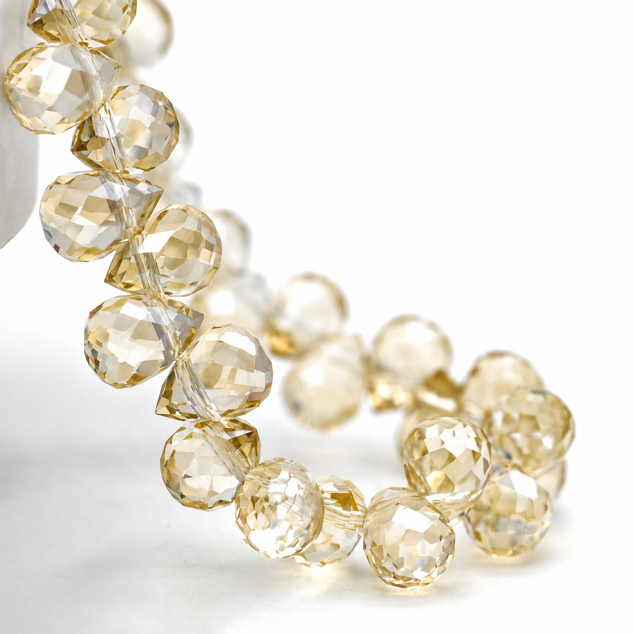 Metallic Silver Champagne faceted teardrop K9 glass bead strand