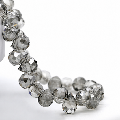 Transparent Gray faceted teardrop K9 glass bead strand