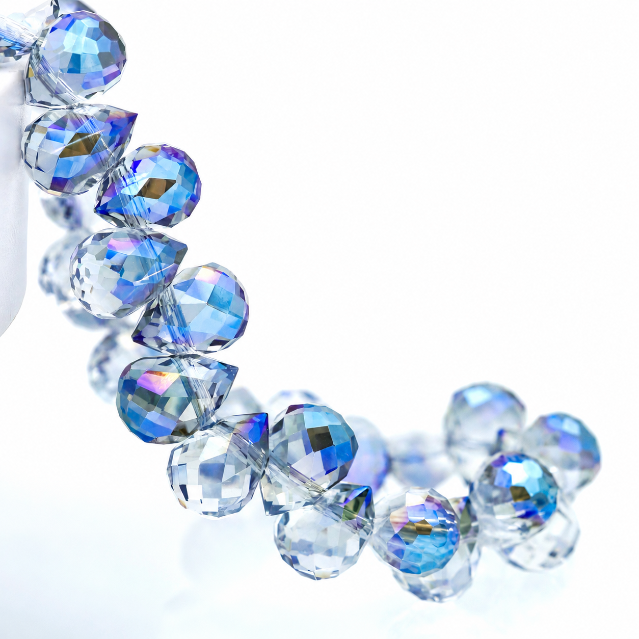 Translucent Blue faceted teardrop K9 glass bead strand
